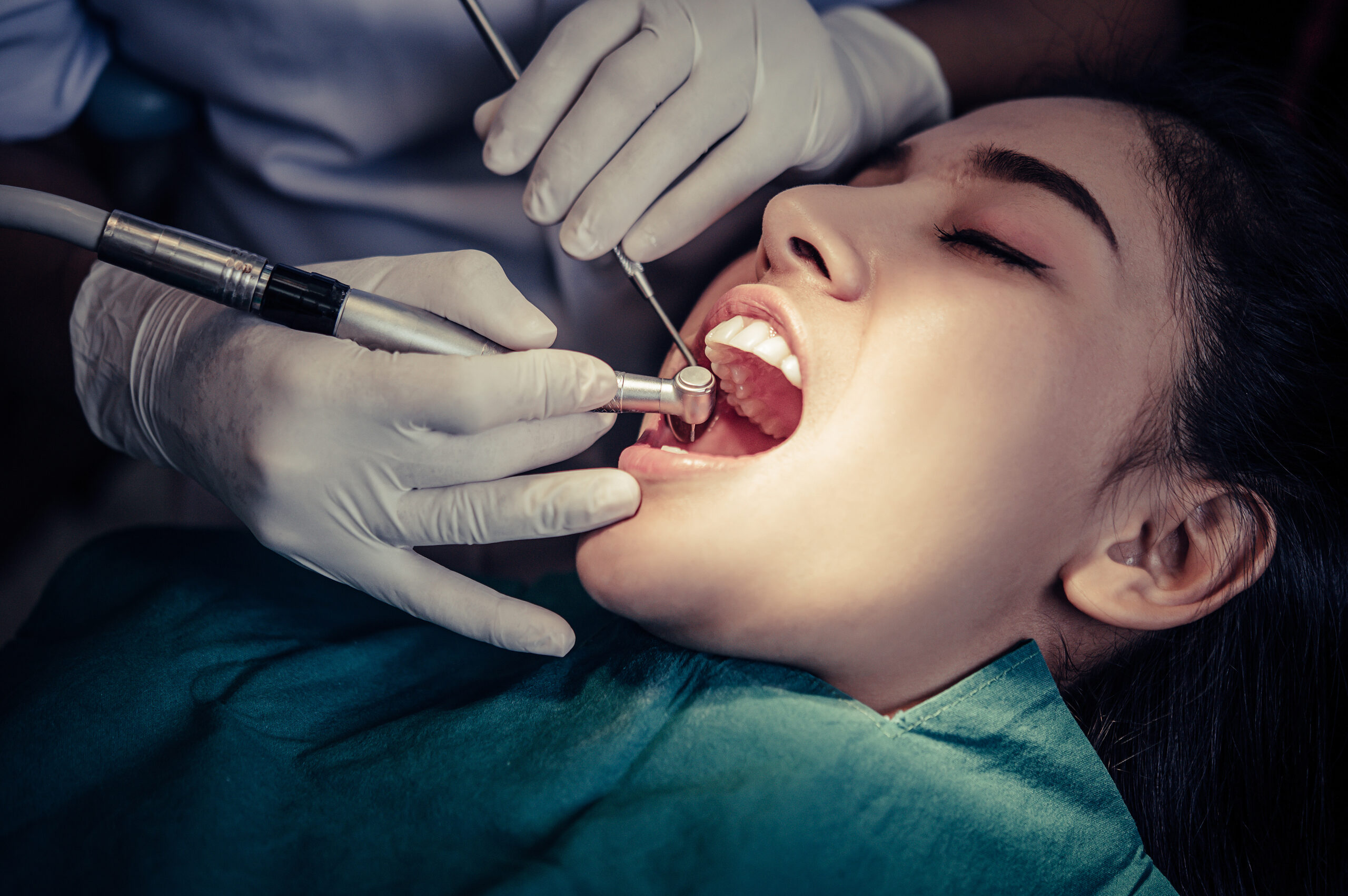 dentists treat patients' teeth.